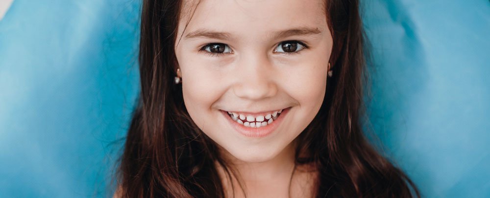 Smiling little girl at dentist