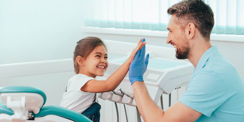 Happy Child with Dentist