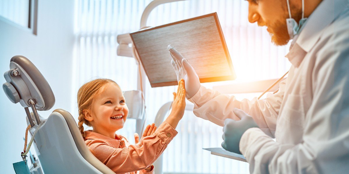 Pediatric Dentist with young patient